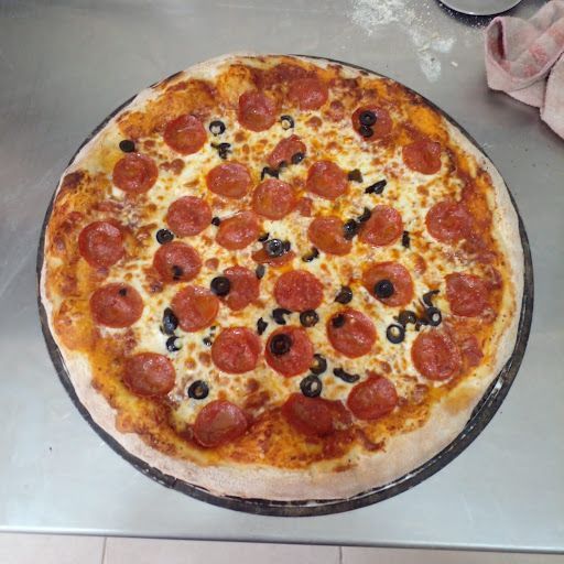 Las mejores pizzas artesanales cerca de mi en Otra Banda