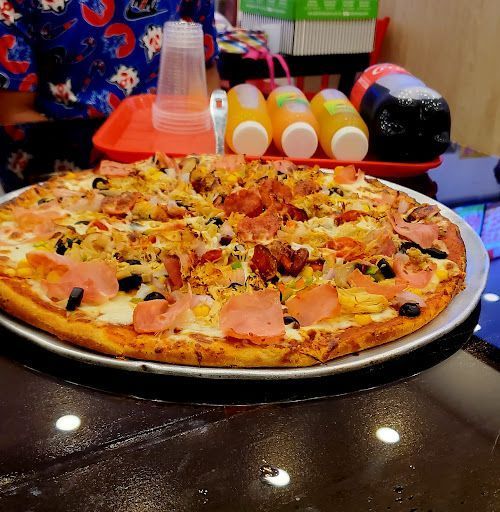 Top pizza